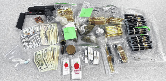 
			
				                                Drugs and cash were found in a man’s car following a traffic stop by EPD.
                                 Courtesy of EPD

			
		